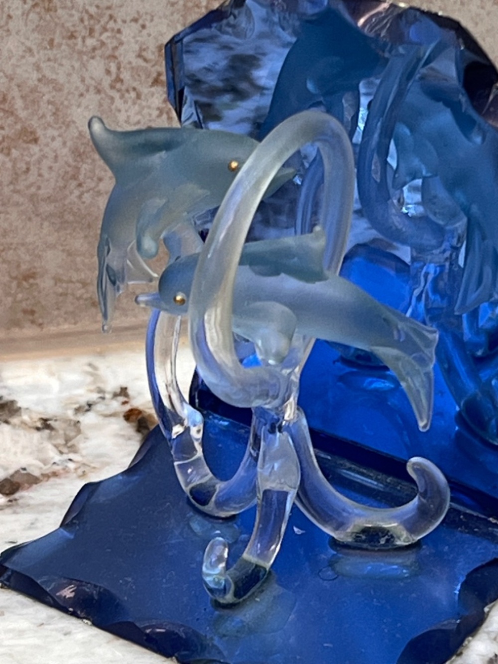 Unique Artico rosted glass dolphins meticulously crafted to leap a glass wave